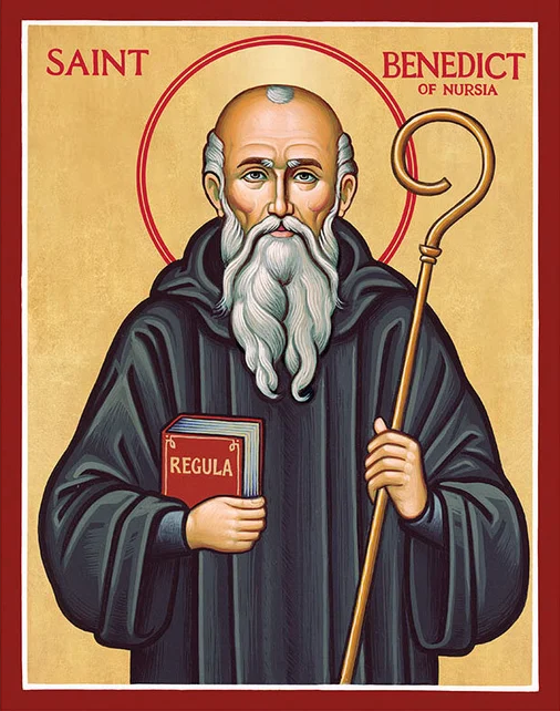 Icon presenting Benedictine of Nursia dressed in a black habit with white hair and beard. Benedict is holding a book with the title 'Regula' (Rule) in his right hand, and a staf in his left. Behind him is a gld background with a red halo.