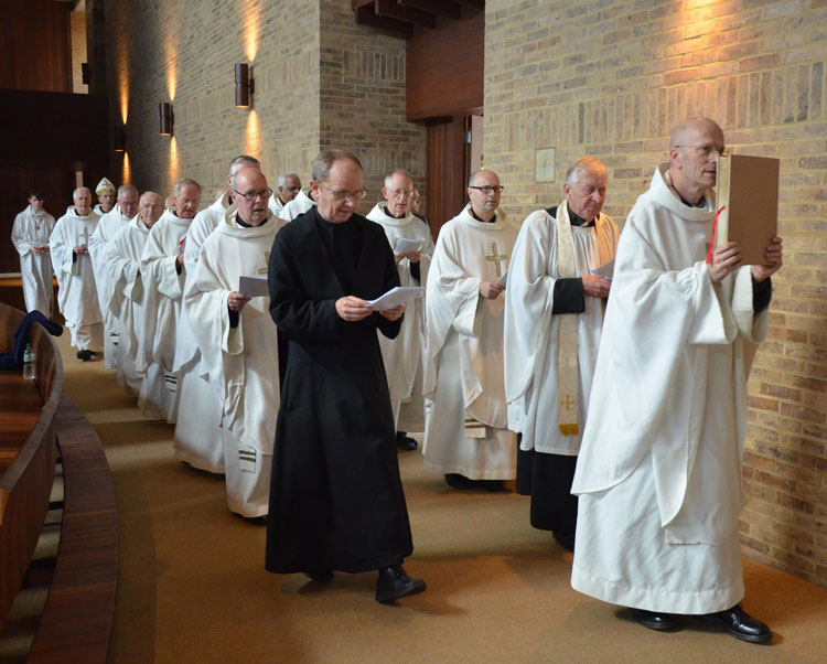 Monks proceeding into prayer